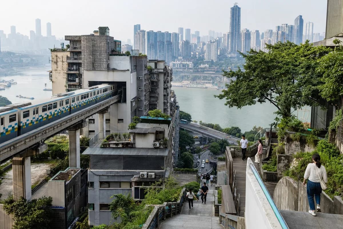 Chongqing's layered hillside streets, elevated rail, and river-city skyline.